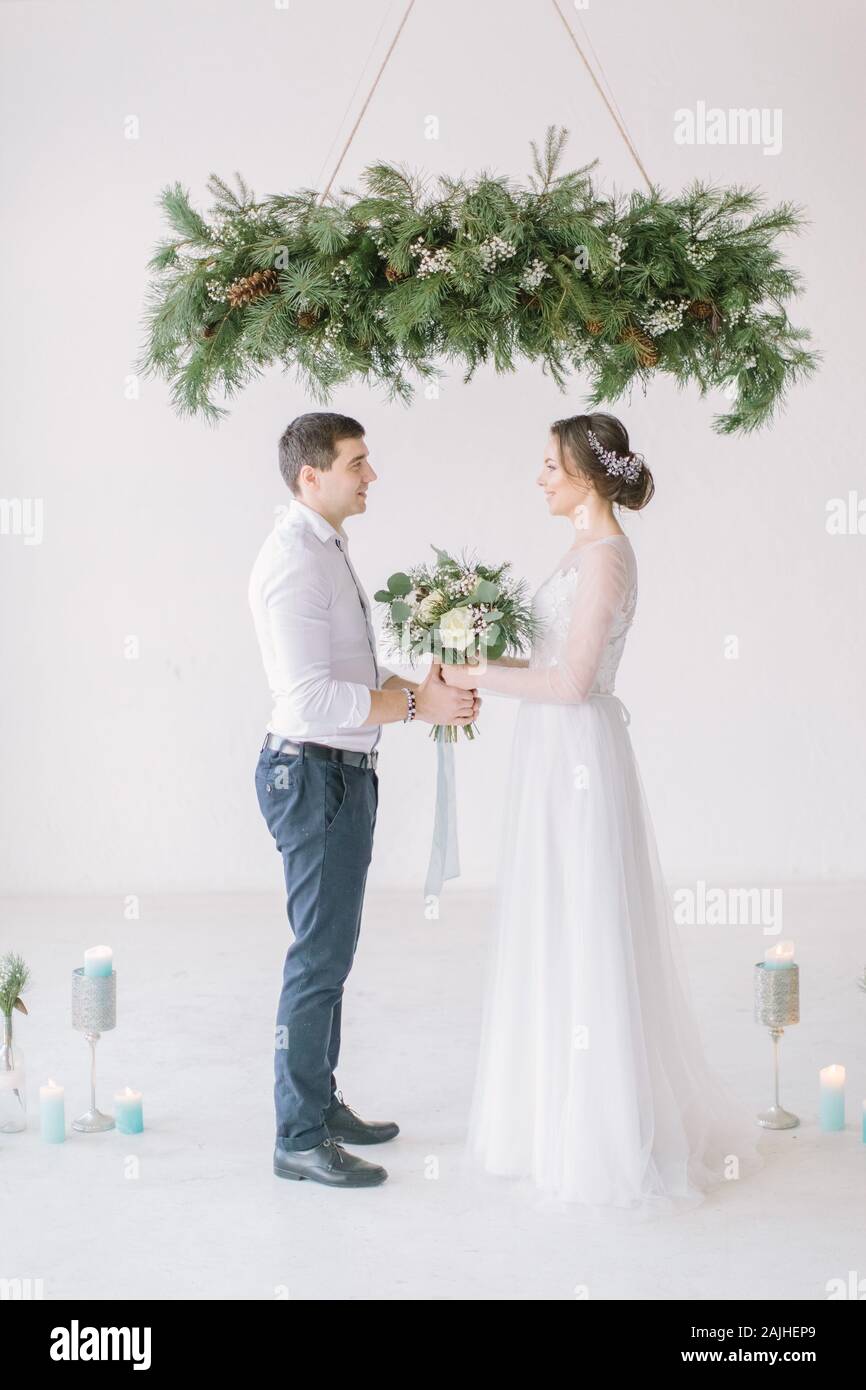 Happy bride and groom after wedding ceremonyWedding ceremony in light