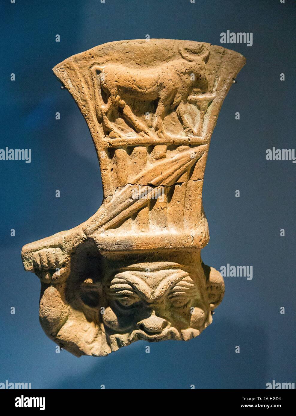 Photo taken during the opening visit of the exhibition “Osiris, Egypt's Sunken Mysteries”. Statuette of the god Bes. Stock Photo