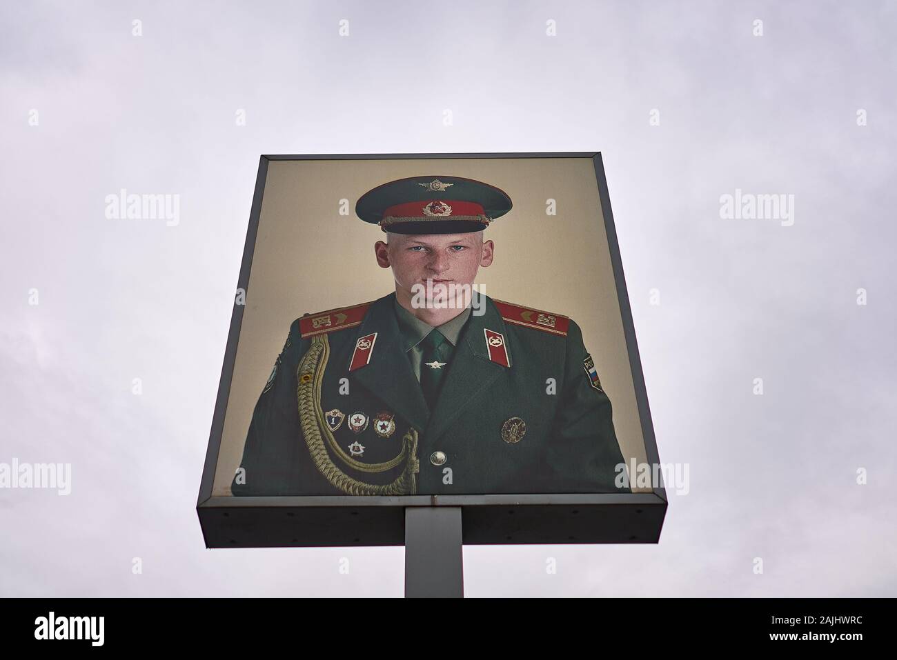 Photo of unknown Russian Soldier posted at the infamous Check-Point Charlie historical site in downtown Berlin. Stock Photo