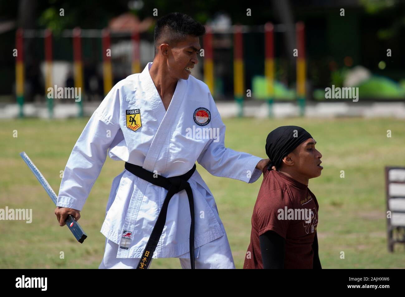 Soldiers train martial arts during the ceremony in Palu City.Soldiers