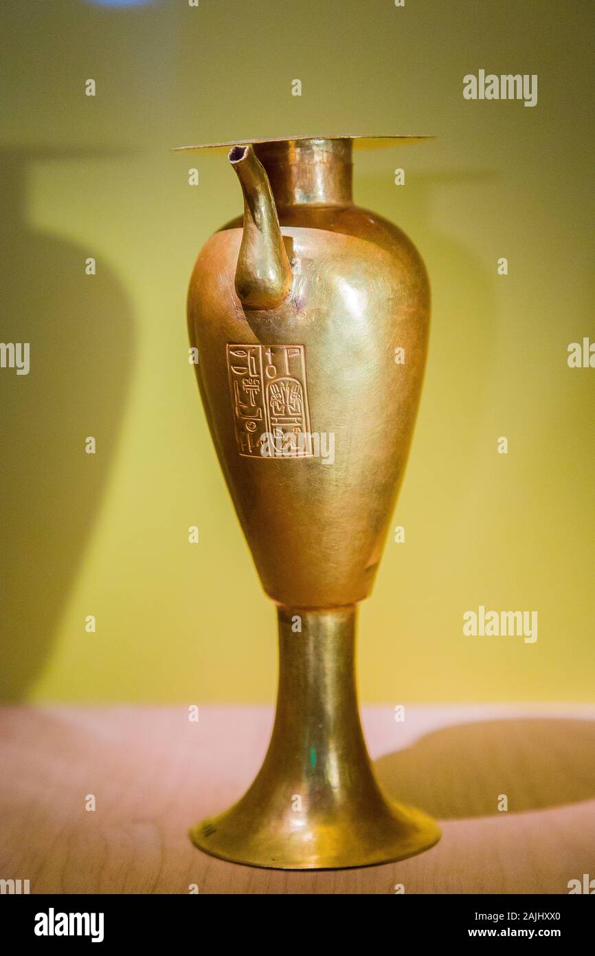 Photo taken during the opening visit of the exhibition “Osiris, Egypt's Sunken Mysteries”. Ewer in gold with a king cartouche. Stock Photo