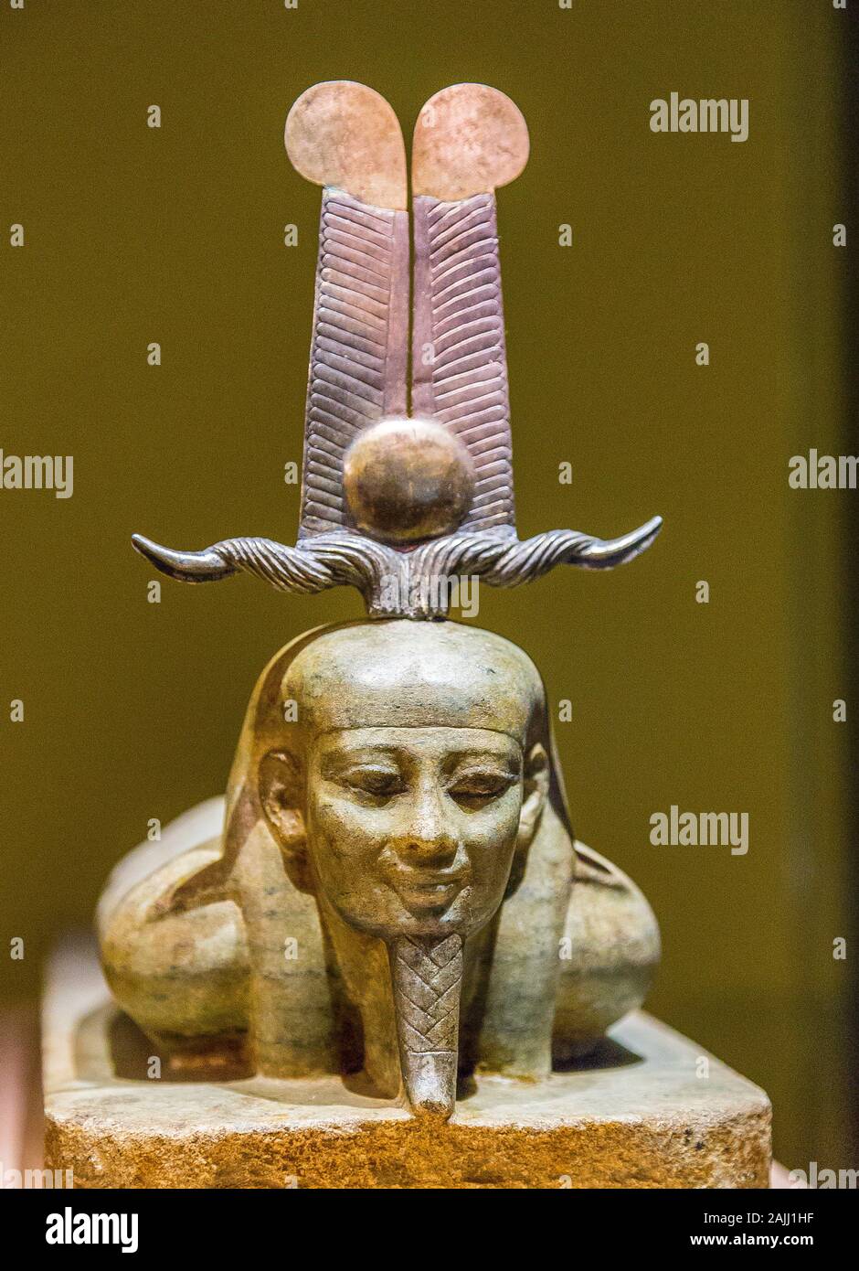 Photo taken during the opening visit of the exhibition “Osiris, Egypt's Sunken Mysteries”. Detail of a statue of the god Osiris awakening. Stock Photo