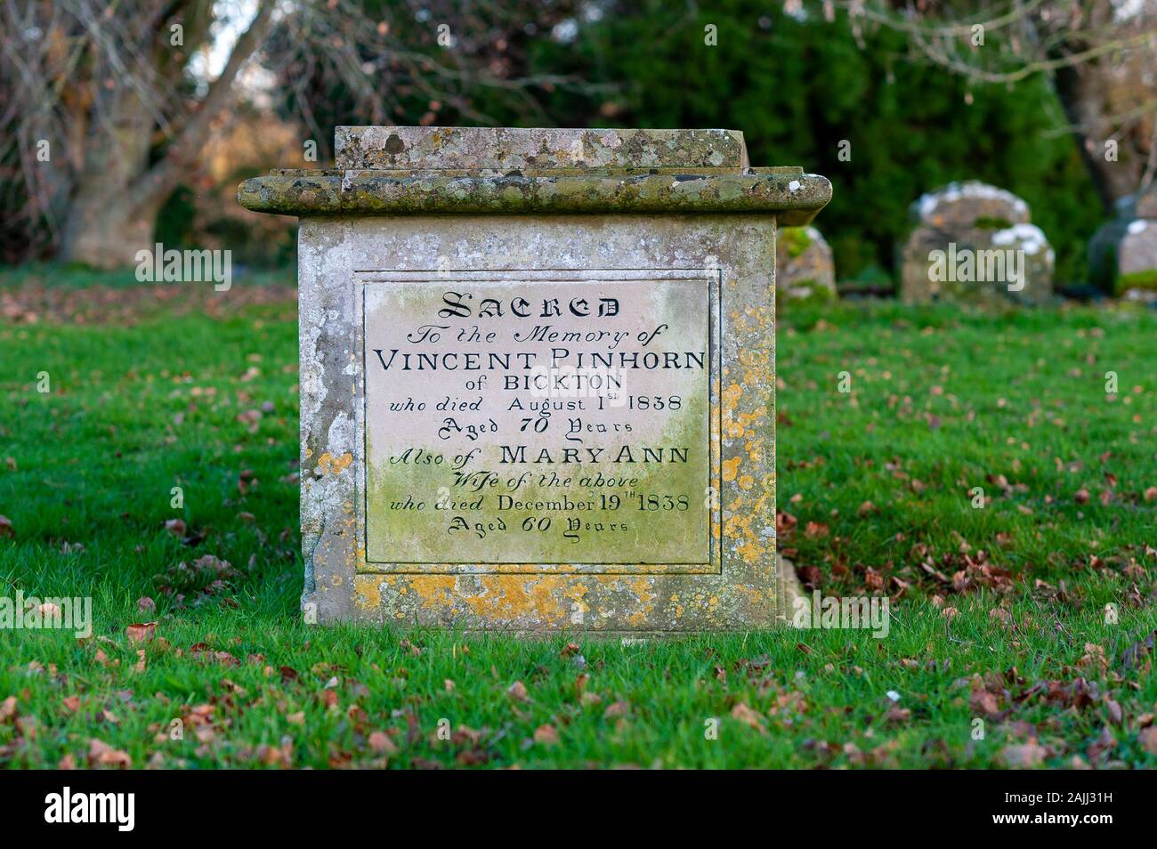 Engravings on a 19th century tombstone in a graveyard in England Stock