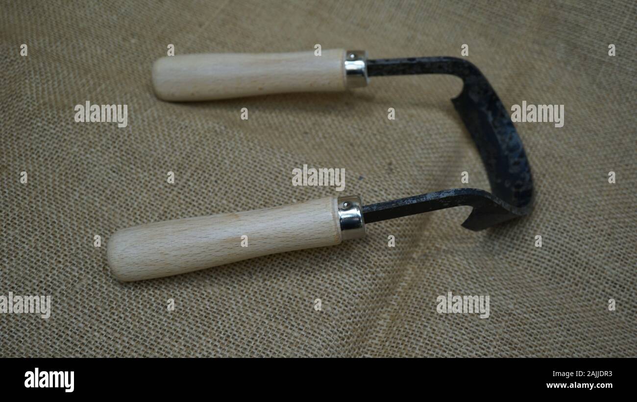 5' half round hand scorp.gouge or shave, hand forged in sheffield england by daegrad tools. constructed with beechwood handles Stock Photo