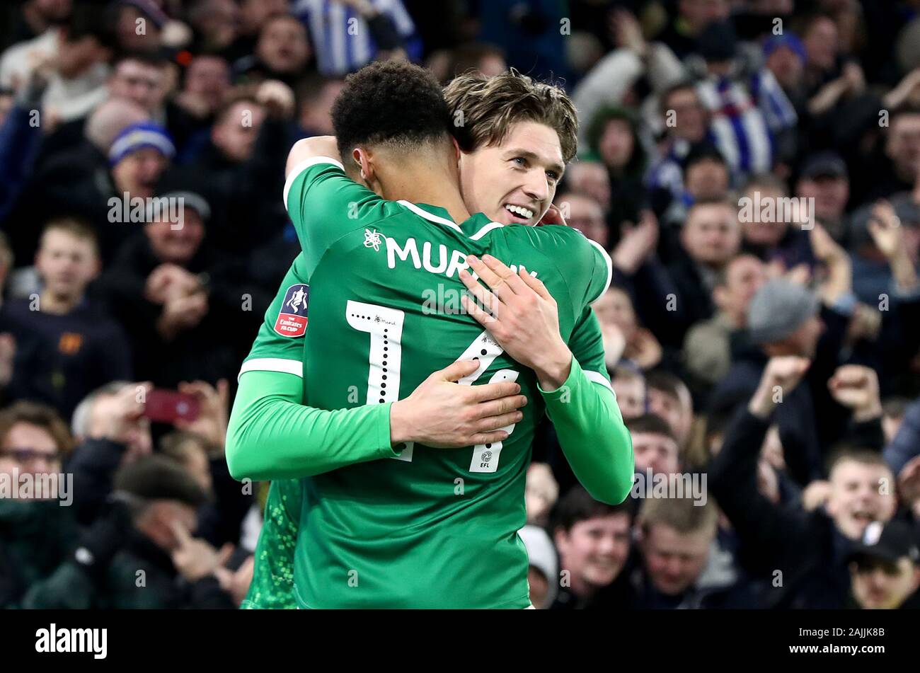 Sheffield Wednesday's Adam Reach celebrates scoring his side's first goal of the game with team-mate Jacob Murphy during the FA Cup third round match at the AMEX Stadium, Brighton. Stock Photo