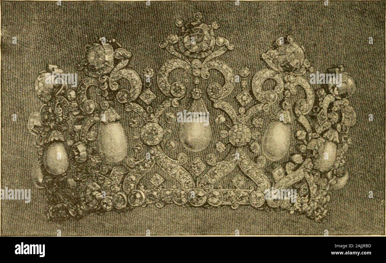 Within royal palaces : a brilliant and charmingly written inner view of emperors, kings, queens, princes and princesses ... . aught by the fins, withhere and there a coral prawn or a tiny little green or browncrab sharing their fate. A great oyster-shell of diamonds inthe powdered hair, with one huge pearl in the middle, andropes of pearls around the neck and wrists, completed thisdainty costume. The stockings and shoes were of pale-greensilk. The new Crown jewels have cost a fabulous amount andwere manufactured by order of Emperor William after hisaccession to the Throne. The Prussian Crown o Stock Photo
