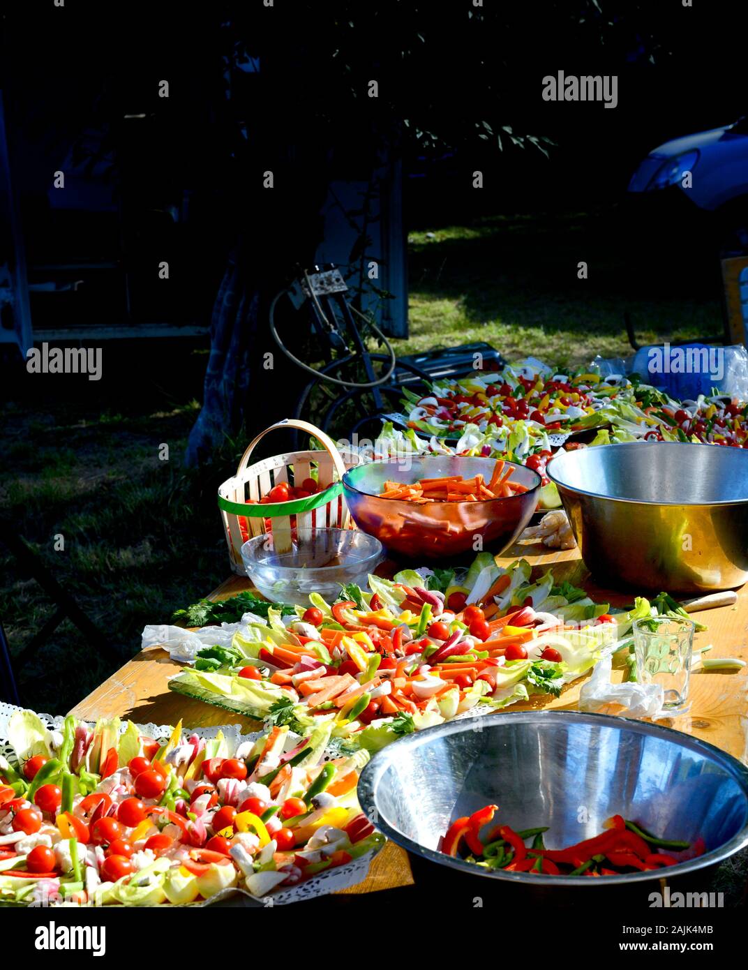 Table of salads ready for evening celebration Stock Photo