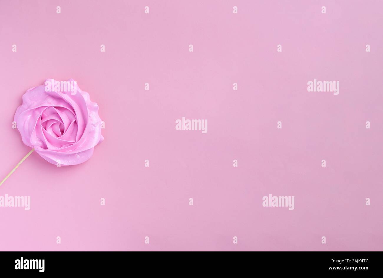 Rose Candy On A Wooden Stick On A Pink Background Panorama