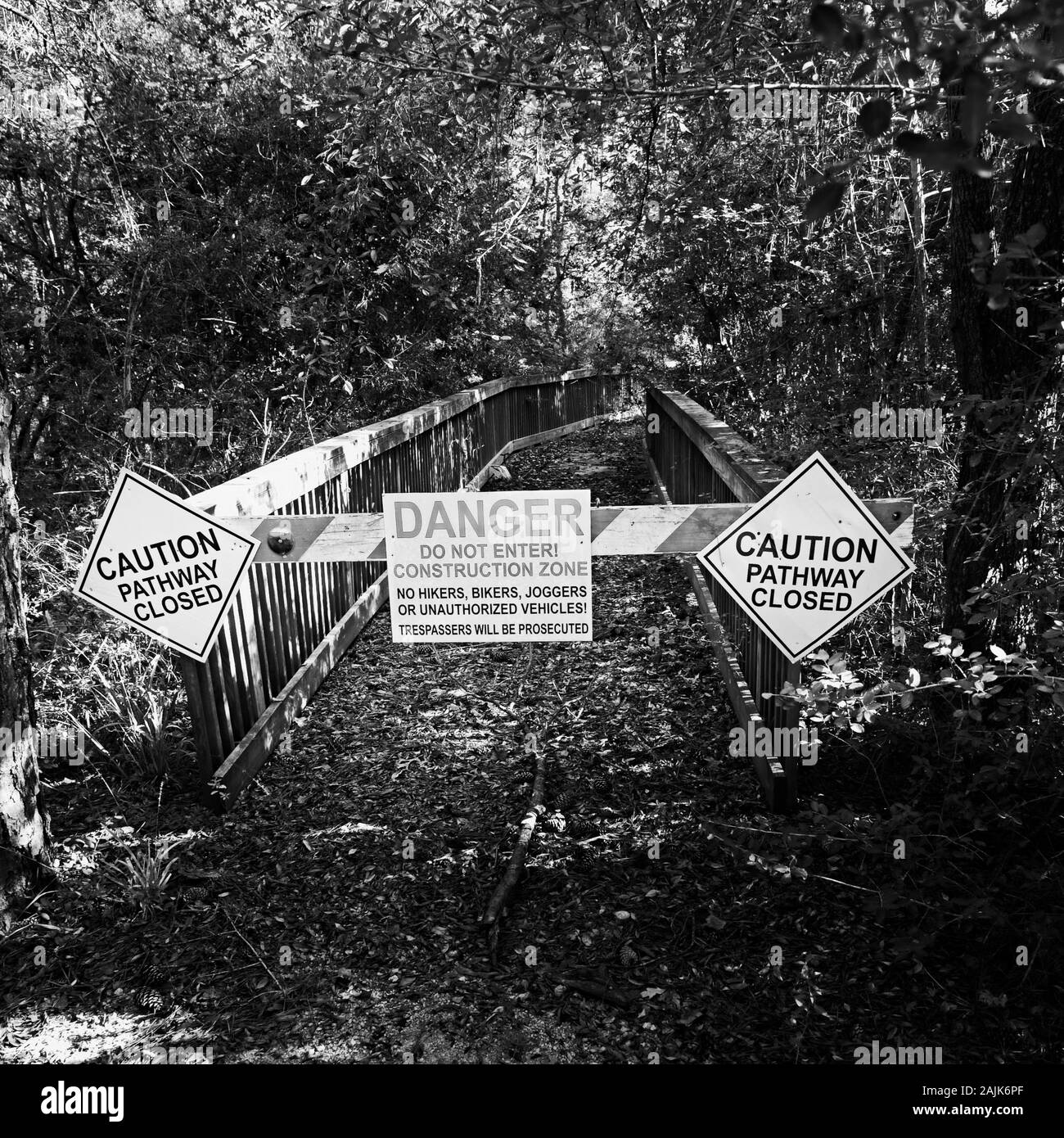 Spring TX USA - 10/10/2019  -  Wooden Bridge Closed Danger Sign 2 in B&W Stock Photo