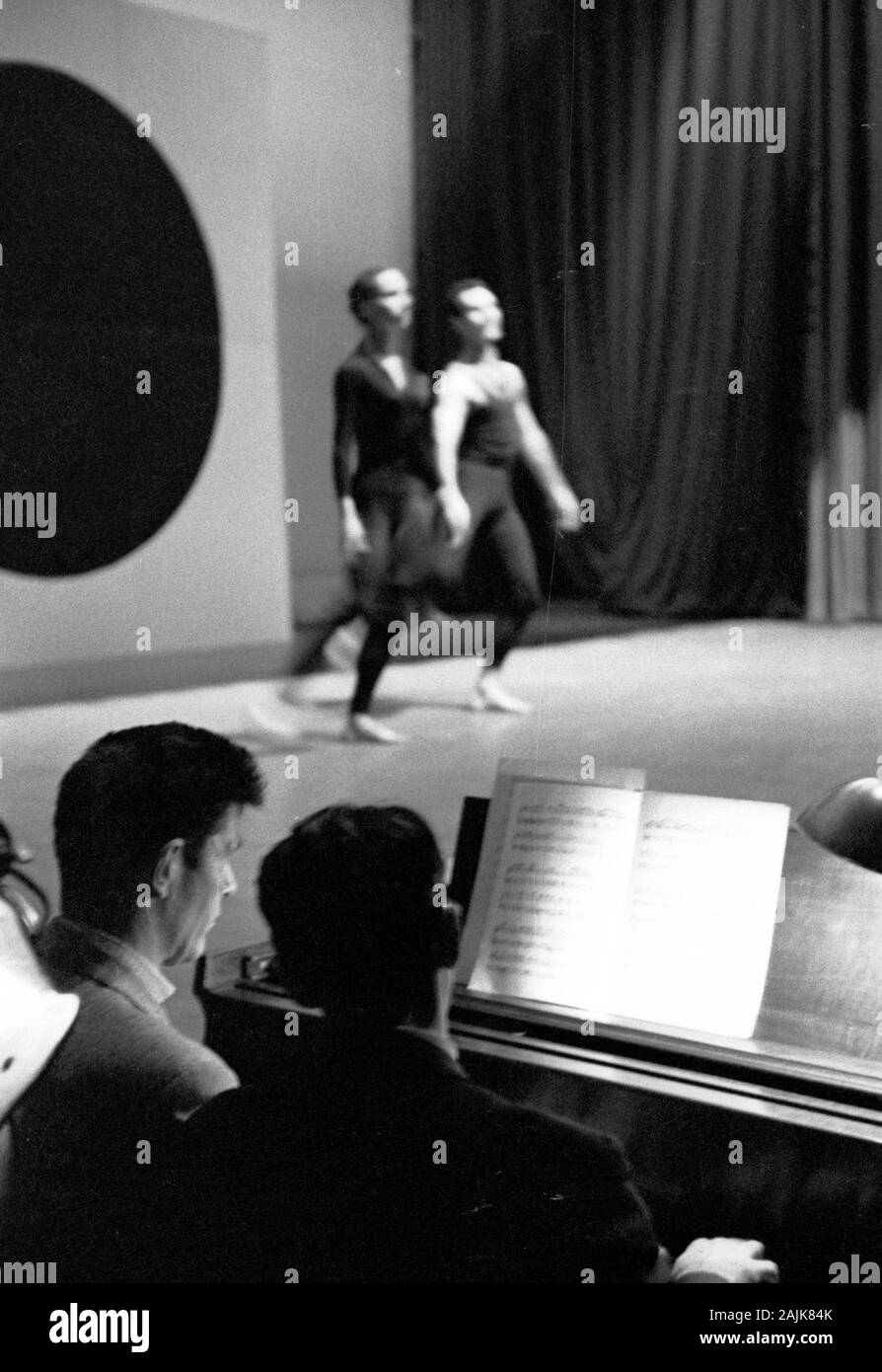 John Cage and David Tudor in performance in New York City, 1957, probably performing Winter Music. The exact date and venue are unknown. Stock Photo