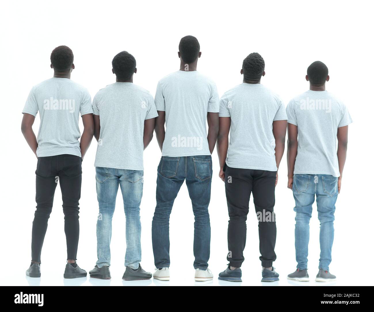 rear view. group of guys looking at white blank screen Stock Photo - Alamy