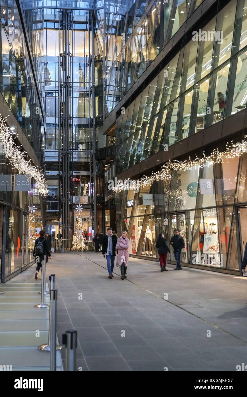 One New Change shopping centre, ground floor level exterior, shoppers, London, UK Stock Photo