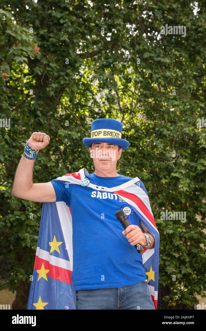 Steven 'Steve' Bray, known as Mr. Stop Brexit Man, raises a fist, exterior portrait, Westminster, London Stock Photo