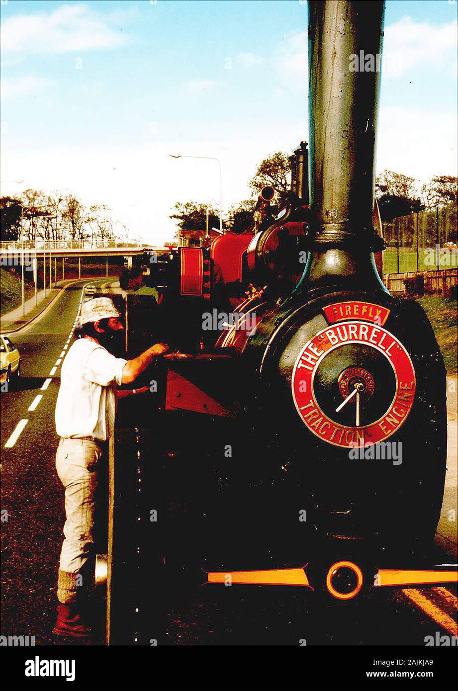 1986 A snapshot of  a Burrell Traction Engine 'Firefly' on the road at Whitby, Yorkshire ,UK. The company  from   Thetford, Norfolk, finally closed in 1928, with the final engines being built by Richard Garrett & Sons at Leiston, Suffolk. Stock Photo