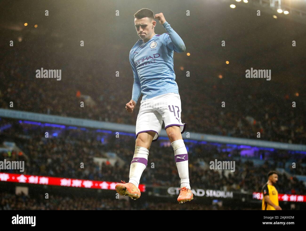 Manchester City's Phil Foden celebrates scoring his side's fourth goal of the game during the FA Cup third round match at the Etihad Stadium, Manchester. Stock Photo