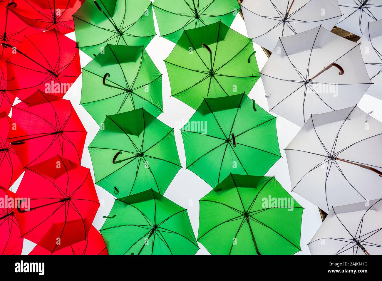 Colorful umbrellas with white, green, red colors from Bulgarian flag Stock Photo