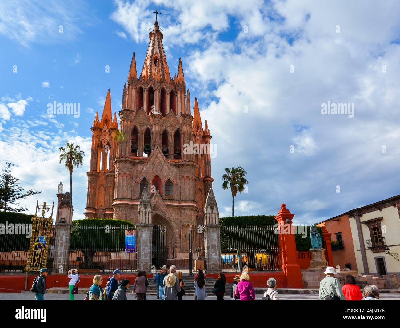 San Miguel de Allende, Mexico - Oct. 22, 2019: Crowd of tourists gather in front of Church of Saint Michael The Archangel. Stock Photo