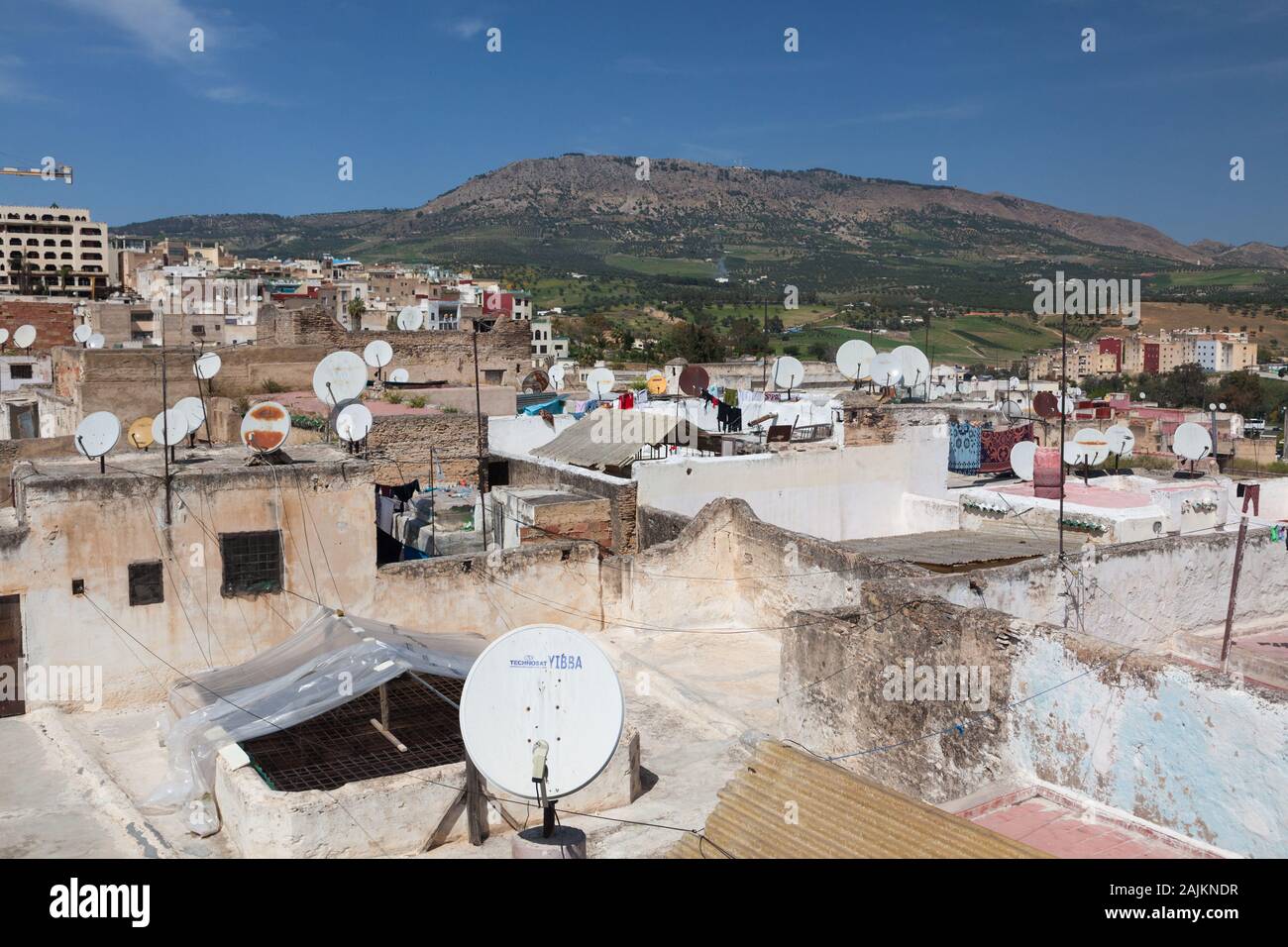 Lots of satellite dishes on the rooftops of buildings in Fes (also known as Fez), Morocco Stock Photo