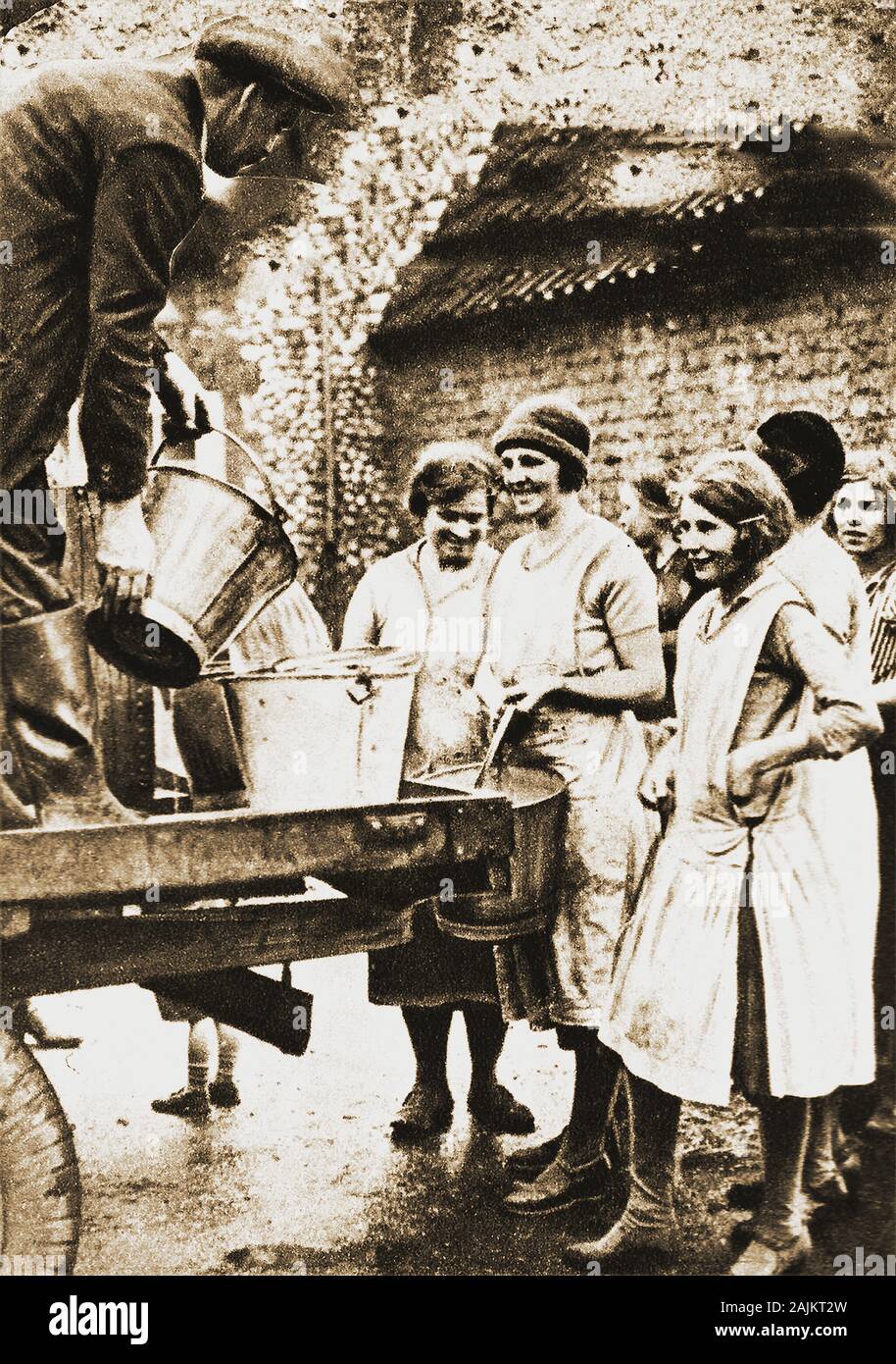 The Great Drought of 1934 (UK)  -  Housewives buying Waters by the bucketful in London. The period between  October 1932    to October 1934 was the third driest 24-month period on record at the time, people were reduced to collecting water from rivers in some areas and to buying it,  particularly in cities such as London, Stock Photo