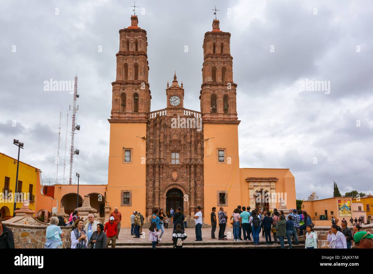 Tourists gather in front of the Church of Our Lady of Sorrows, Dolores Hidalgo, Mexico. Stock Photo