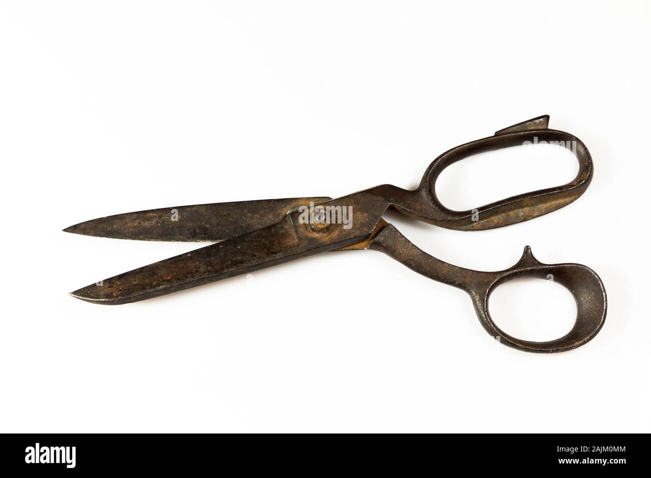 Oldfashioned rusty scissors on white background Stock Photo Alamy