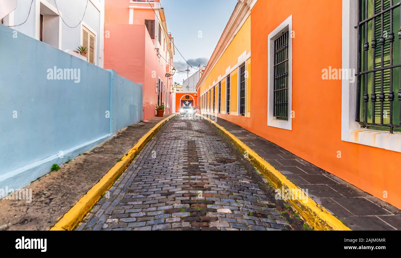 Cobblestone street and colorful houses in city centre of Old San Juan, Puerto Rico Stock Photo