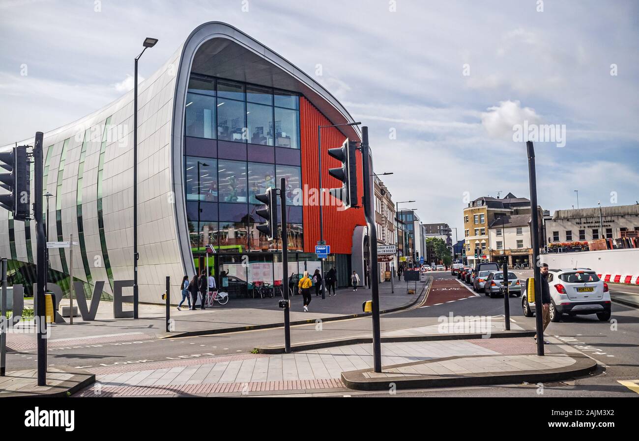 The Curve: Library section, Slough city centre, UK. Also showing (right) area of demolition as part of the city centre renovation project. Stock Photo