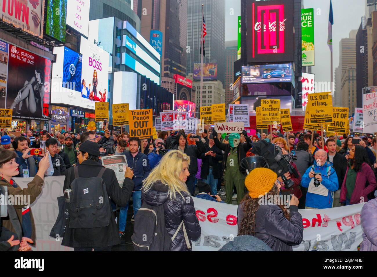 New York, NY – January 04, 2020: Hundreds of people gathered in Times Square in New York City to protest war against Iran & Iraq on January 4th 2020. Stock Photo