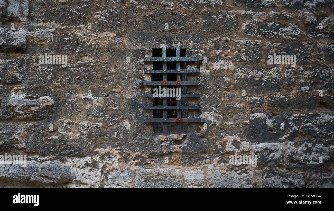 Rusty Old Iron Bars Block The Tiny Window In A Medieval Stone Wall In The Amazing Tourist Destination Village Of Rothenburg Germany Stock Photo Alamy