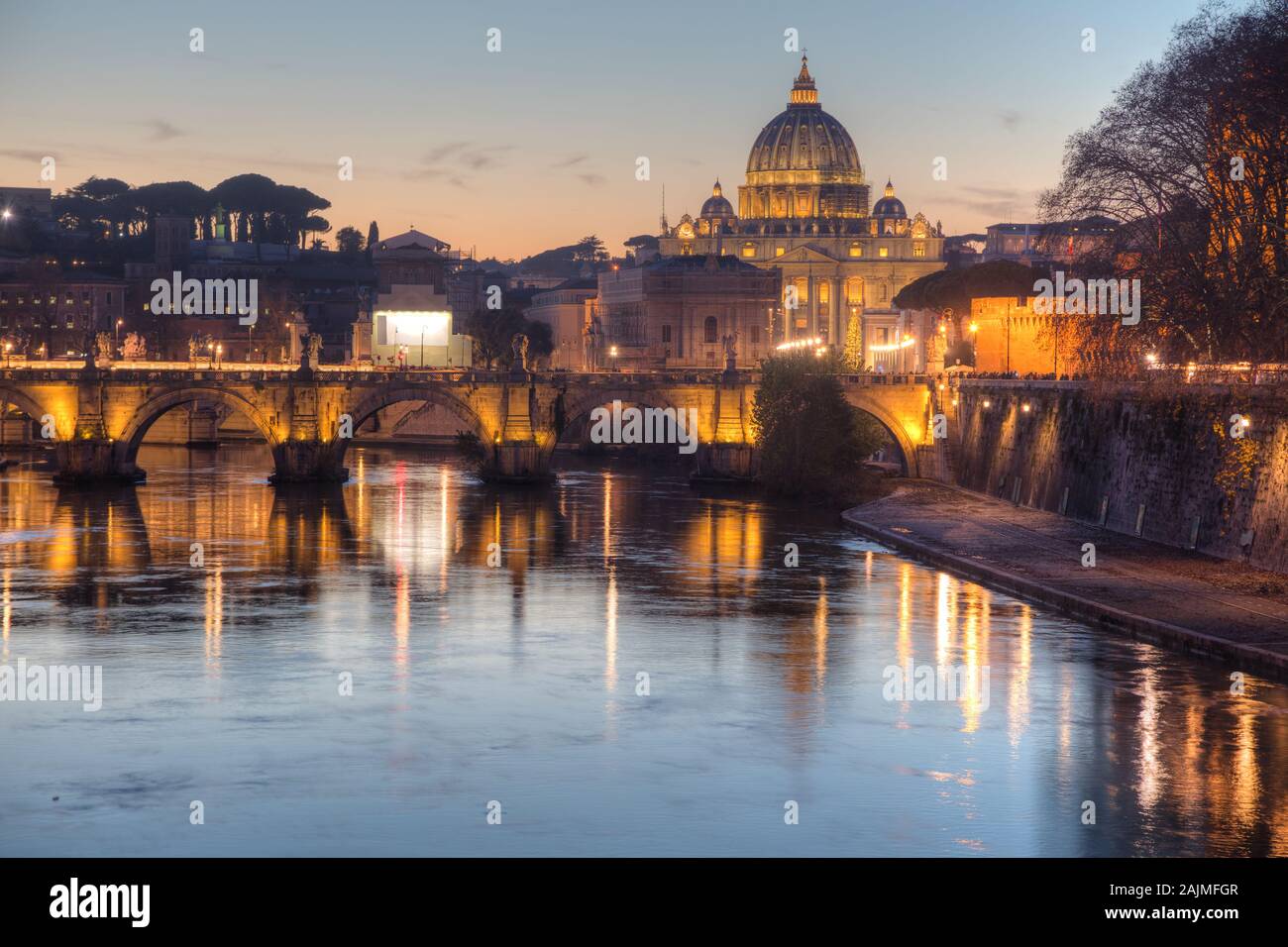 Rome overview with the Papal Basilica of St. Peter in the Vatican city at night Stock Photo
