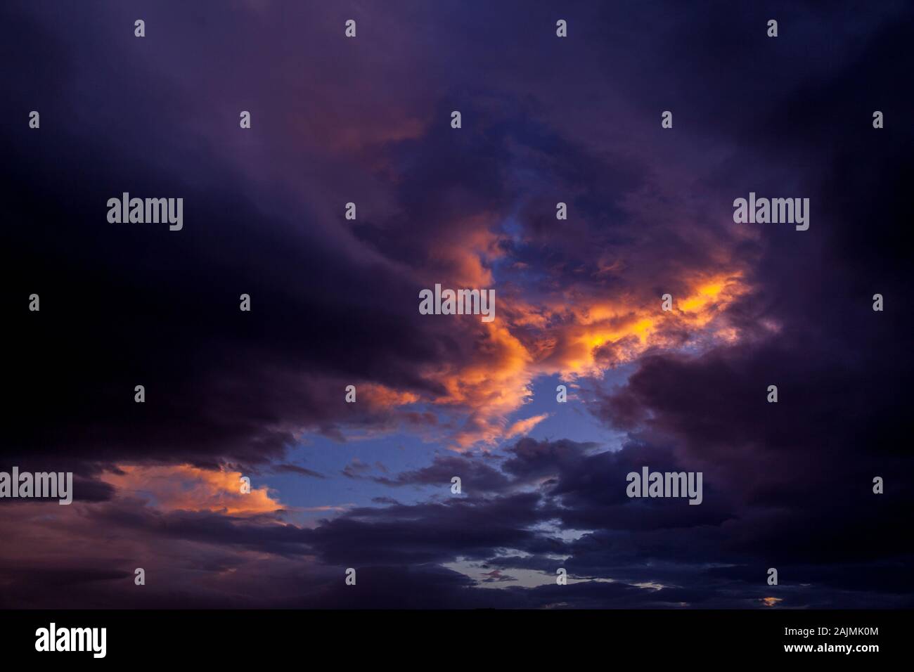 Dark sunset clouds over Athens, Greece, Europe Stock Photo