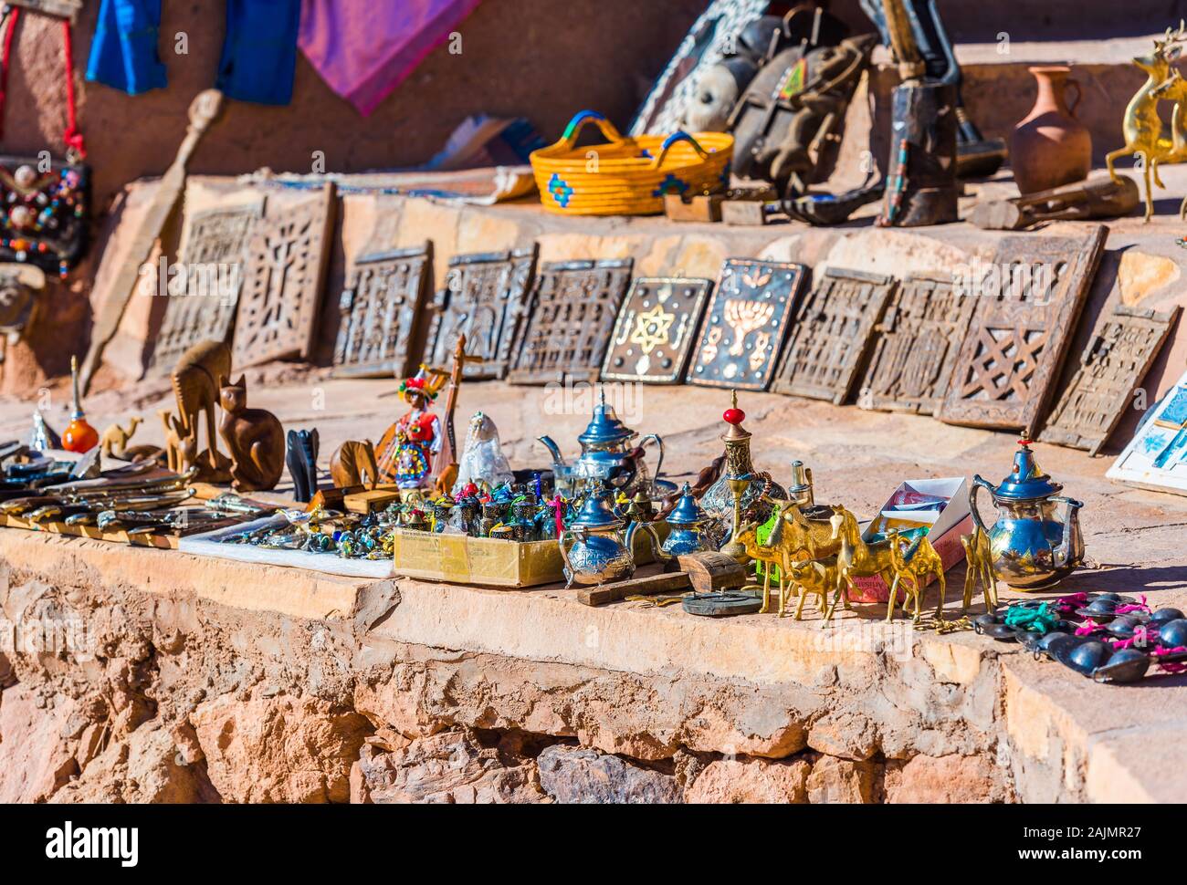 AIT-BEN-HADDOU, MOROCCO - NOVEMBER 12, 2019: Moroccan souvenirs on a city street. With selective focus Stock Photo