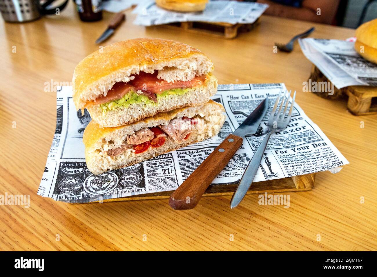 A salmon guacamole and tuna sandwich in dough bread in Gentilicio, Mallorca, Spain Stock Photo