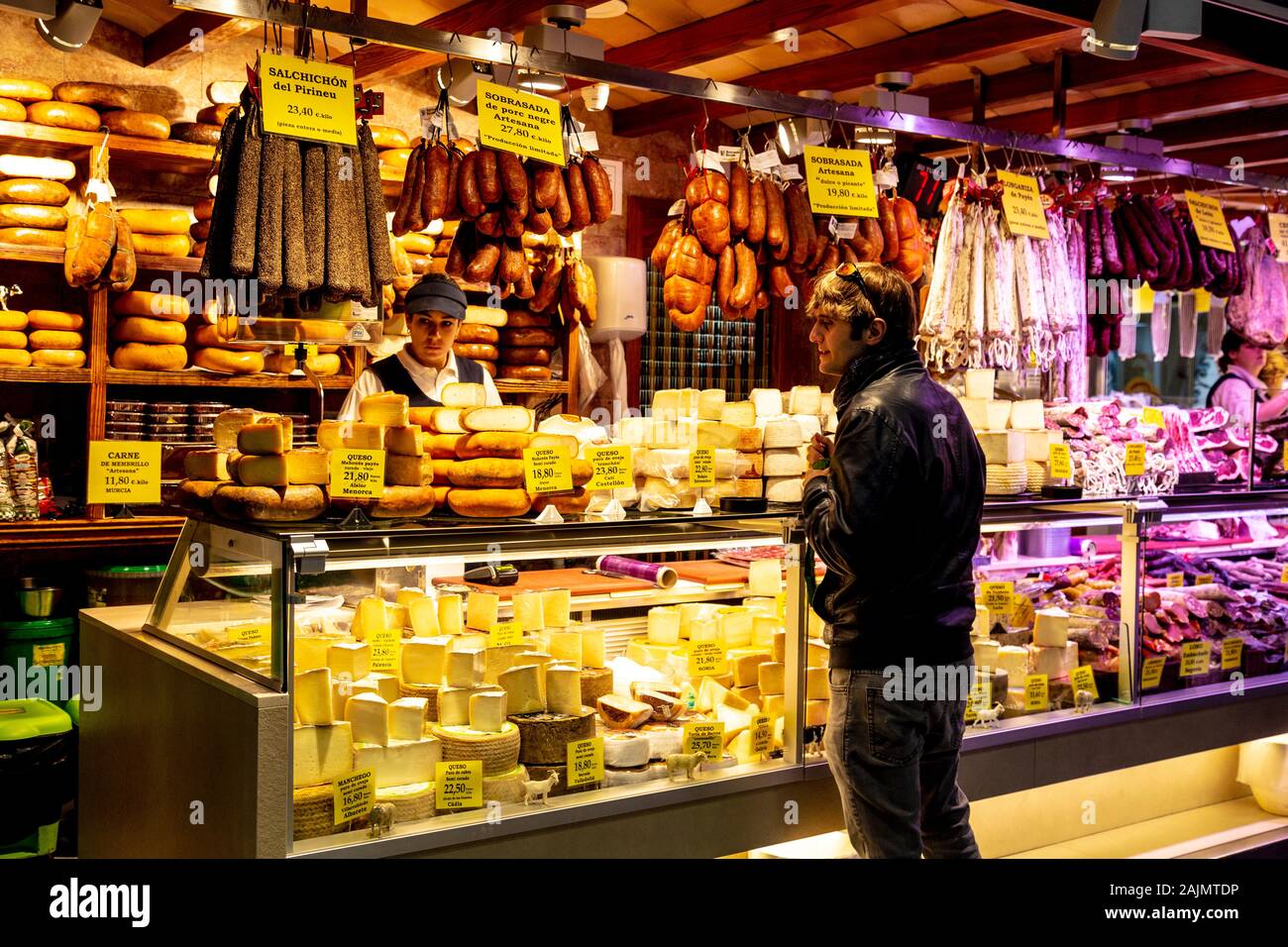 Cheesemongers and charcuterie at Mercat de l'Olivar, Palma, Mallorca, Spain Stock Photo
