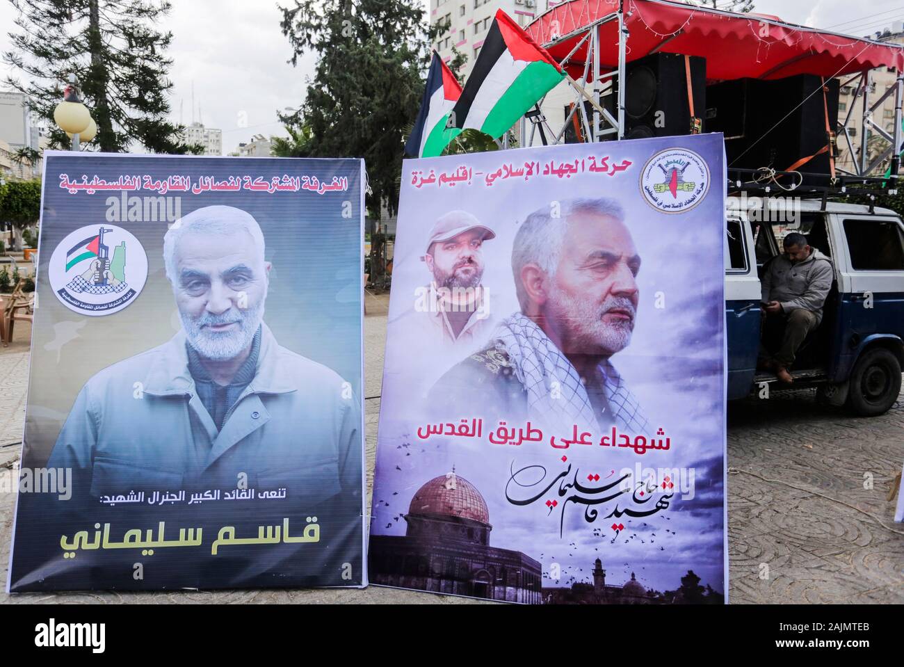 Placards with pictures of Qassem Soleimani, the Iran's head of the Quds Force who was killed during the US air strike are seen during the event in Gaza City. Stock Photo