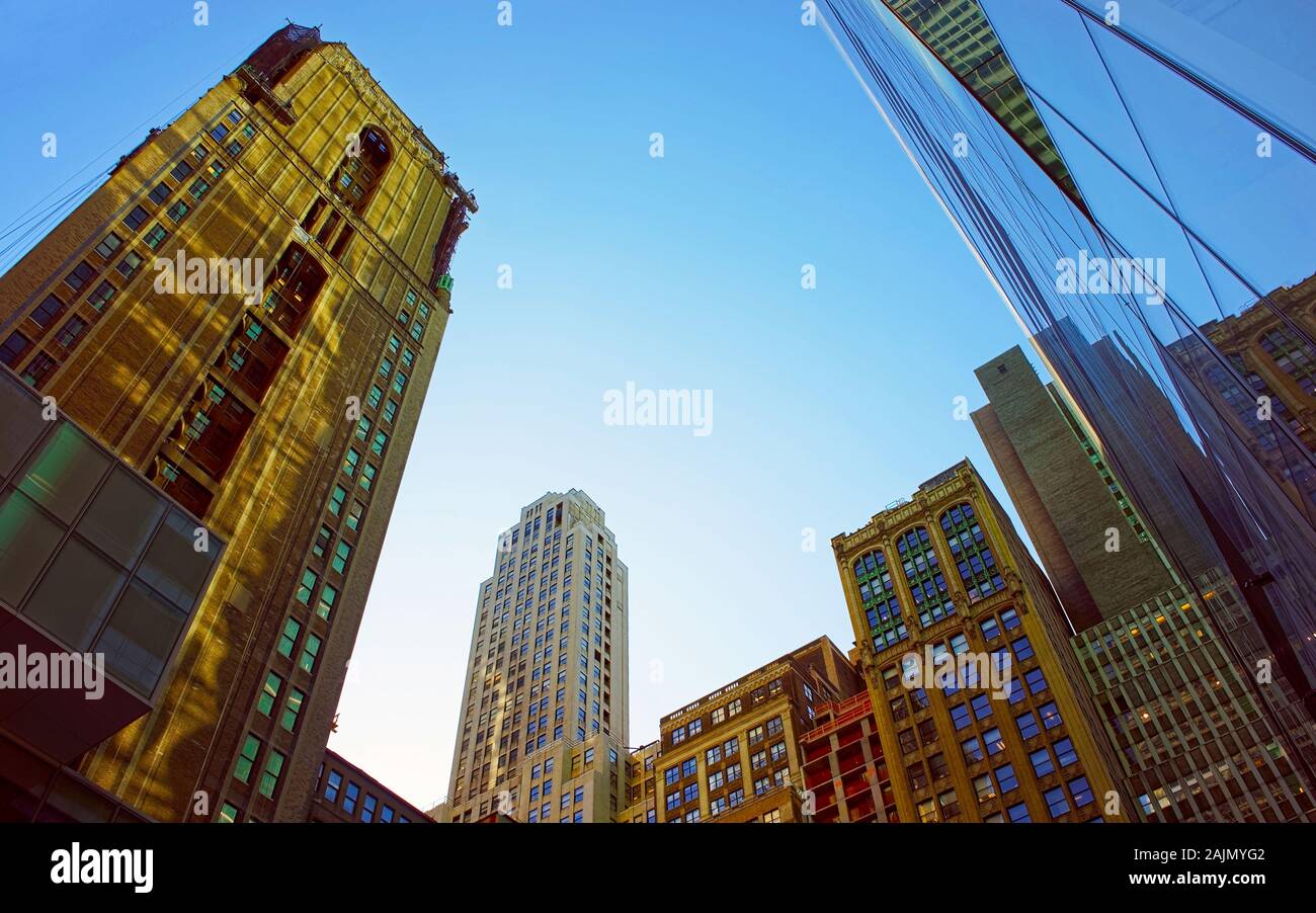 Modern glass skyscrapers under the clear blue sky reflex Stock Photo ...