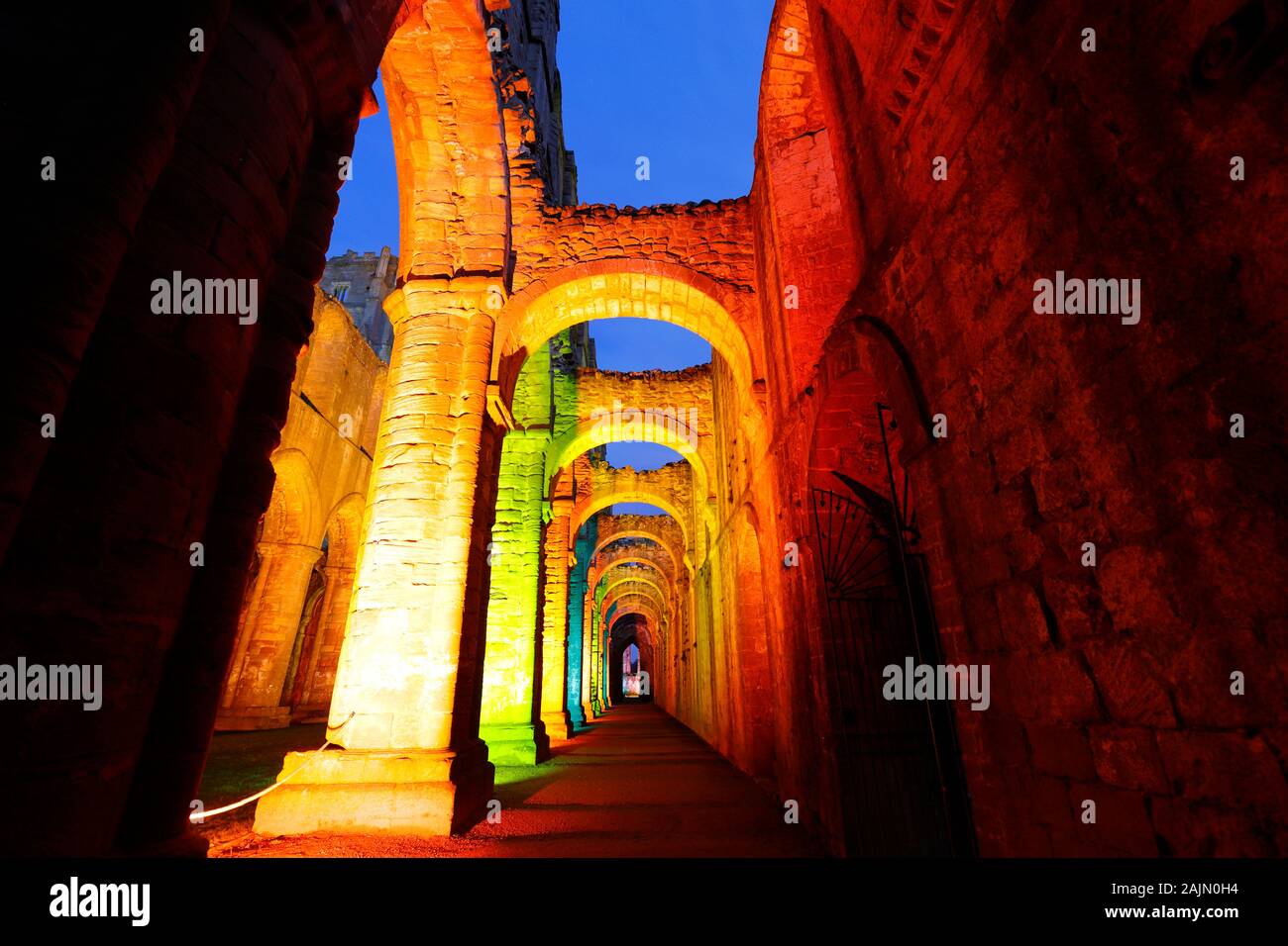Fountains Abbey Nave during a christmas multicoloured illuminations