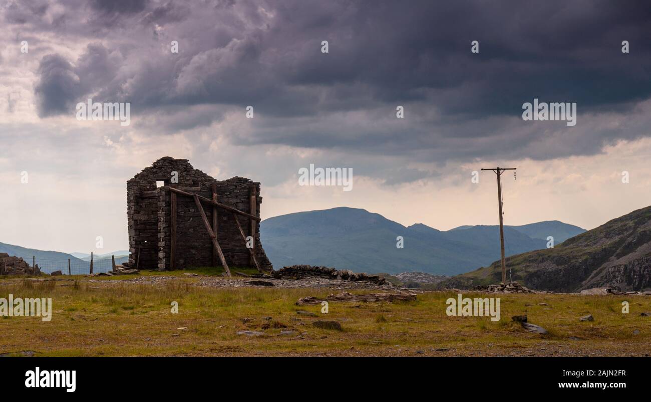 The ruins of an industrial building at Croesor Quarry on Moelwyn Mawr mountain in Snowdonia, North Wales. Stock Photo