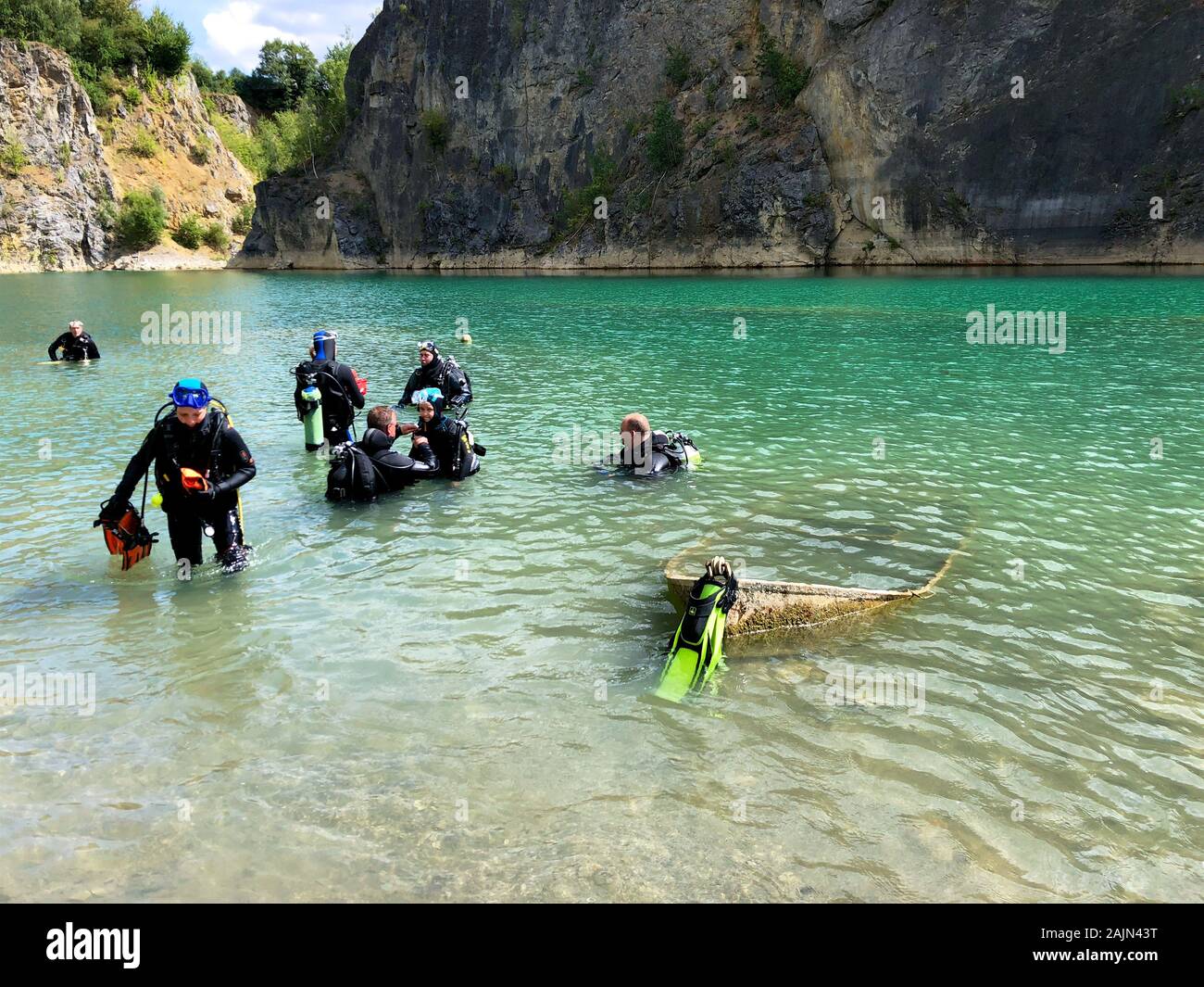 Quarry explored by scuba divers. Flooded quarry for adrenaline hobby