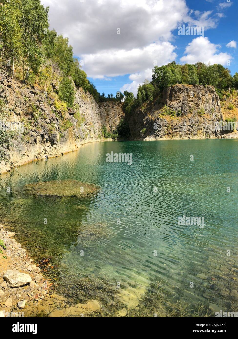 Fishing at deep quarry lake hi-res stock photography and images - Alamy