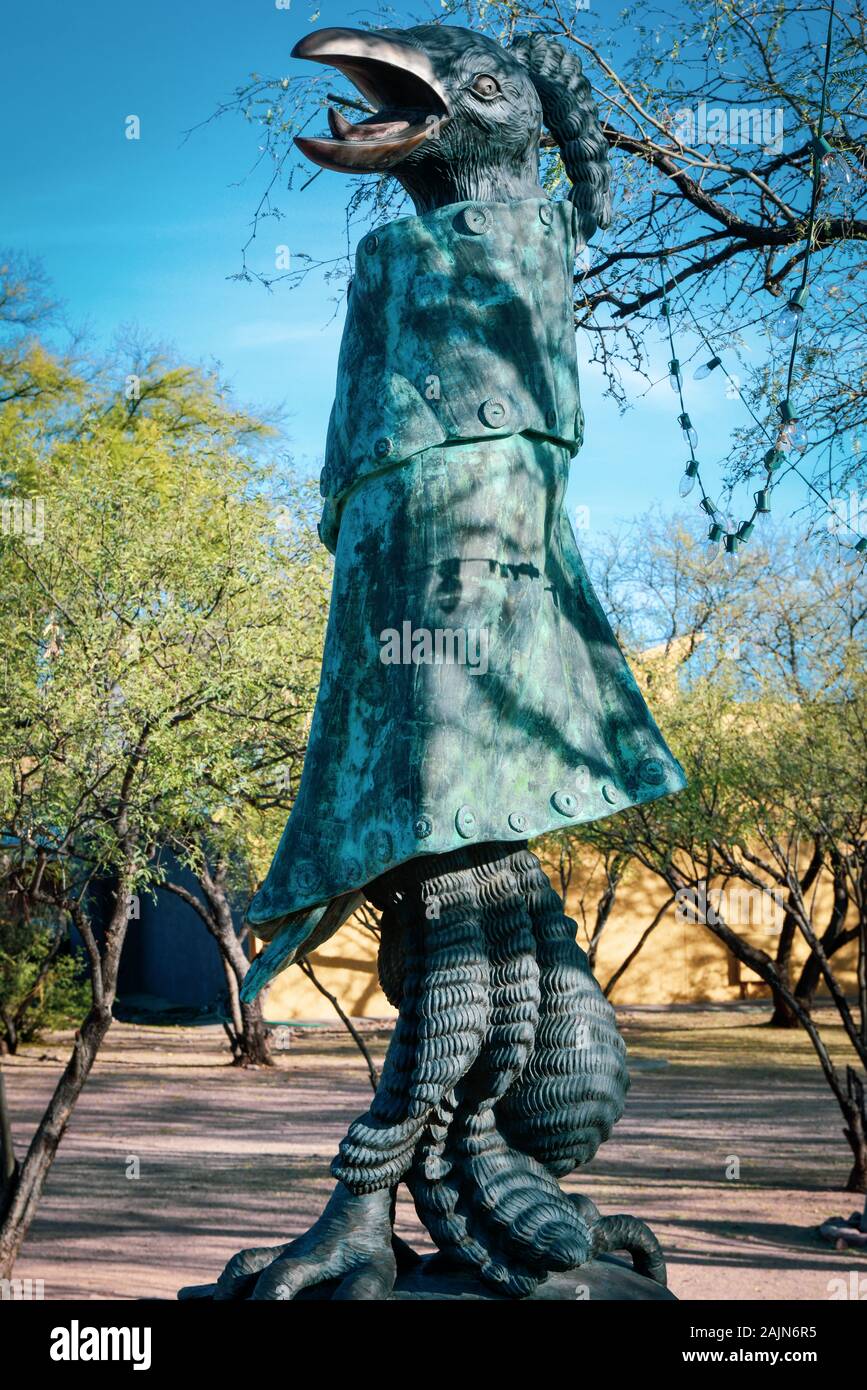An otherworldly, bird like creature sculptured in metal with strange