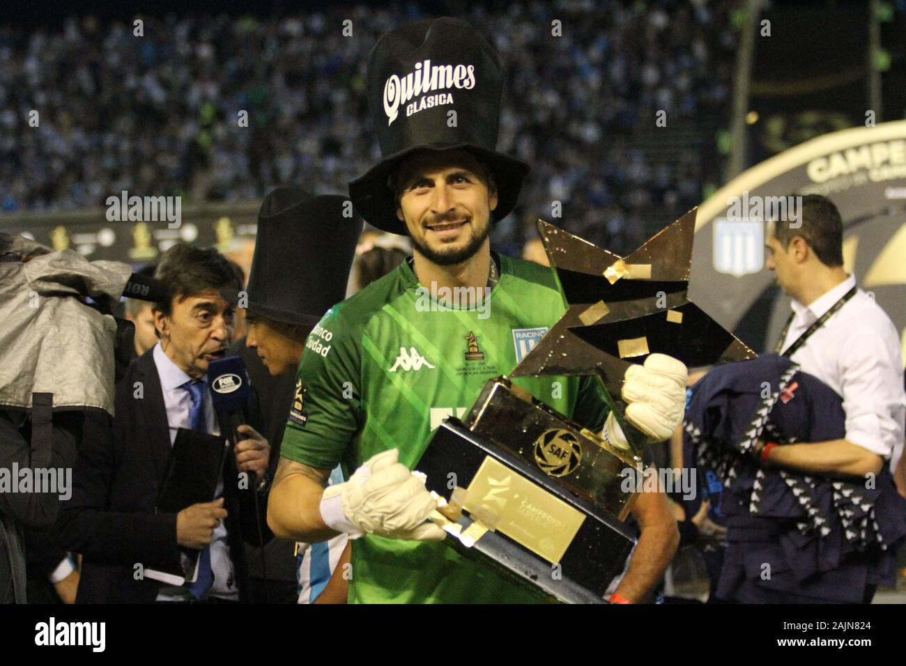 Mar del Plata, Buenos Aires, Argentina. Dec. 14 th 2019. Gabriel Arias lifts the Champions Trophy won by Racing Club Stock Photo