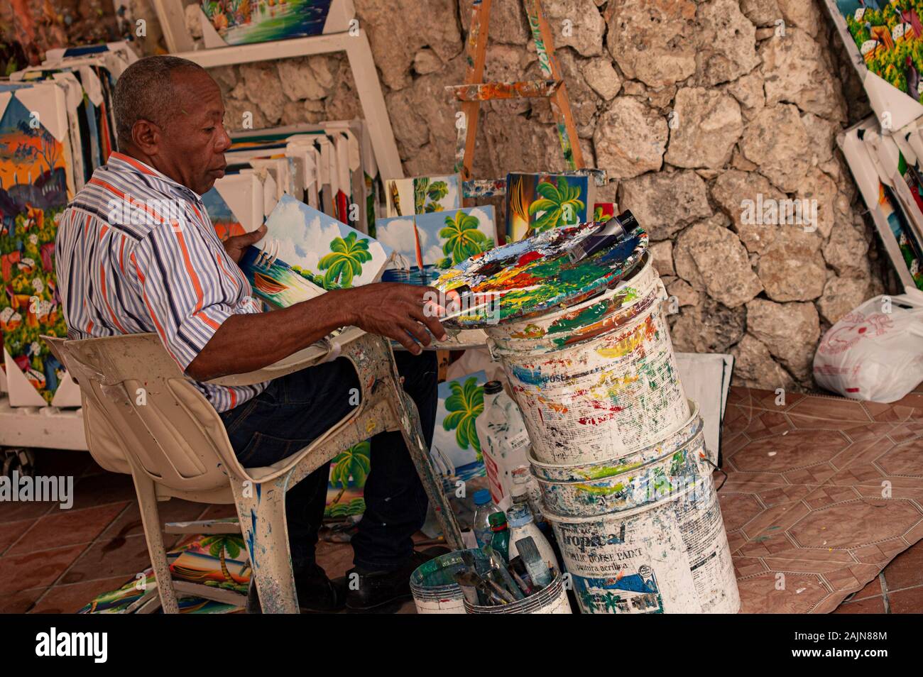 Dominican painter paints Stock Photo