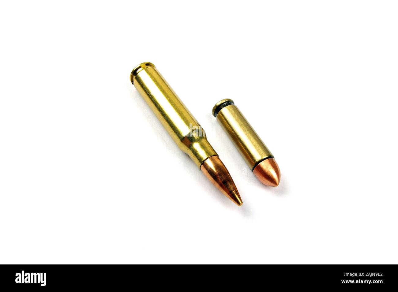 two shiny brass bullets on a pure white background Stock Photo