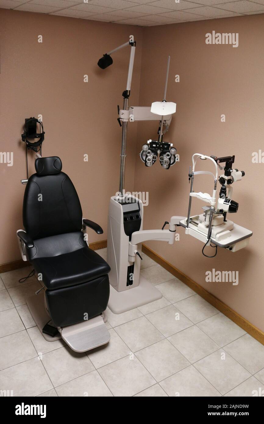 Equipment in an exam lane for an optometrist or ophthalmologist in an eye doctor clinic Stock Photo