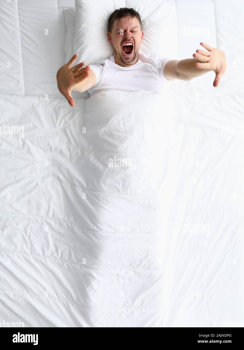 Young caucasian beauty woman sleeping on white bed Stock Photo - Alamy
