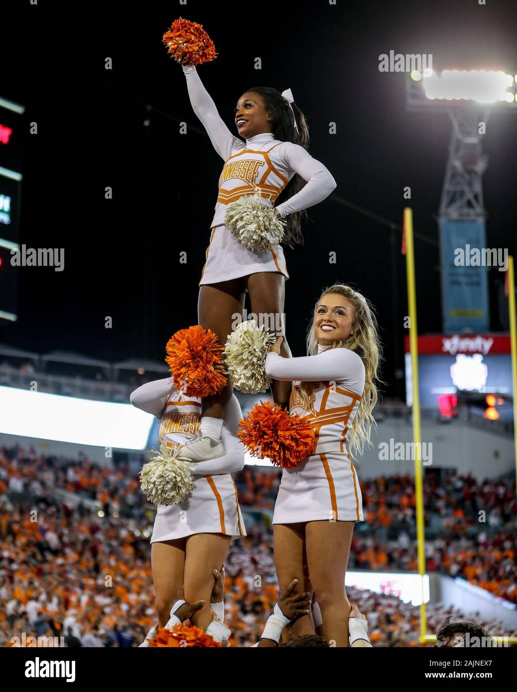 Jacksonville, FL, USA. 2nd Jan, 2020. The Tennessee cheerleaders perform a pyramid stunt on the sidelines during the TaxSlayer Gator Bowl football game between the Indiana Hoosiers and the Tennessee Volunteers at TIAA Bank Field in Jacksonville, FL. Kyle Okita/CSM/Alamy Live News Stock Photo