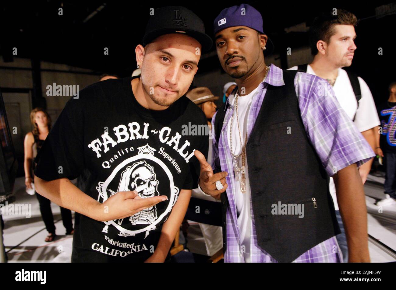 (L-R) DJ Dre Sinatra and Singer / Actor Ray J on set at New Boyz featuring Ray J 'Tie Me Down' Music Video on August 17, 2009 in Los Angeles, California. Stock Photo