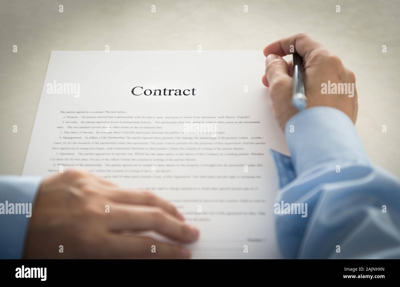 Businessmen have read the contract before you sign it Stock Photo Alamy