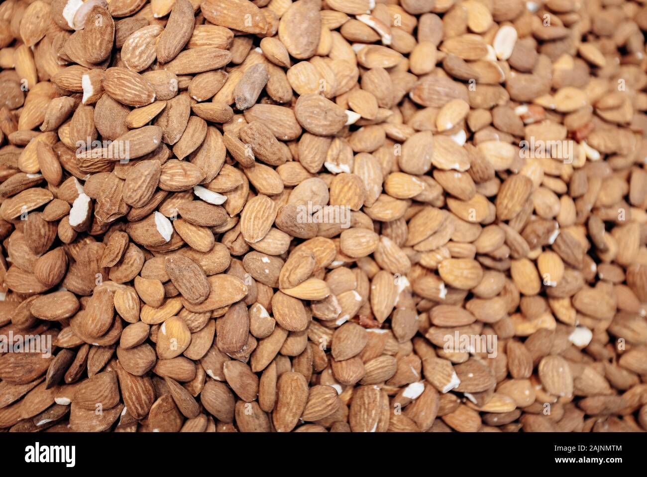 Background make from salt pistachios in a shell. A lot of pistachio